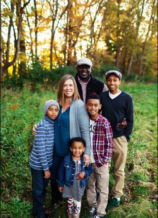 African Plum Home Owner and Family