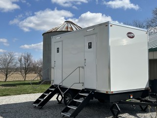 Mobile trailer restroom from Love's Restroom Rentals.