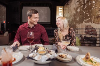 A couple enjoys date night at the Prewitt.