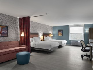 A beautiful double queen room at Home2 Suites.